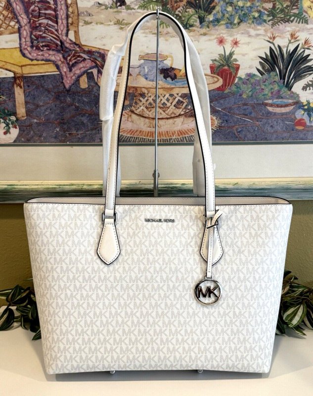 CARTERA MK BLANCA FLORES GRAND Y NEGRO