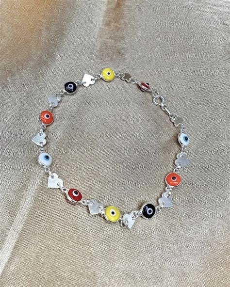 NICOLE PULSERA CORAZON OJO TURCO